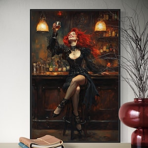 May include: A framed print shows a woman with vibrant red hair toasting with a glass in a bar. She's dressed in black and seated on a stool. The bar is filled with bottles, and the scene is lit with warm, inviting light.