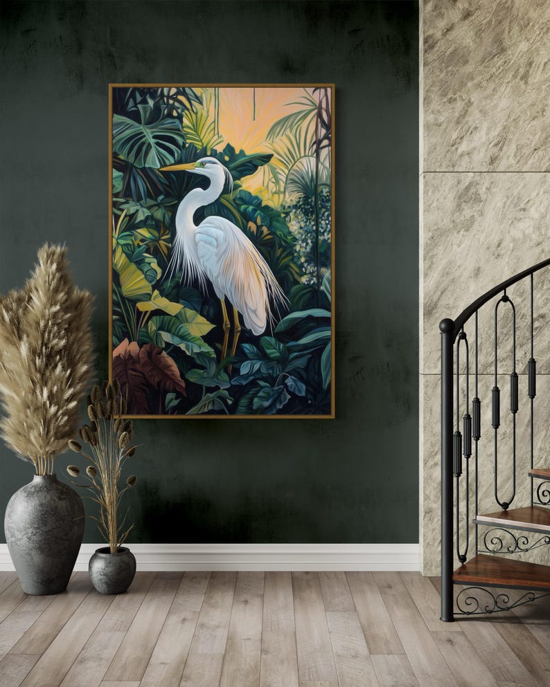 This canvas print captures a majestic heron standing amidst lush tropical foliage, illuminated by a soft, golden sunrise. Its detailed portrayal and vibrant setting make it a striking piece for any nature or bird enthusiast's collection.