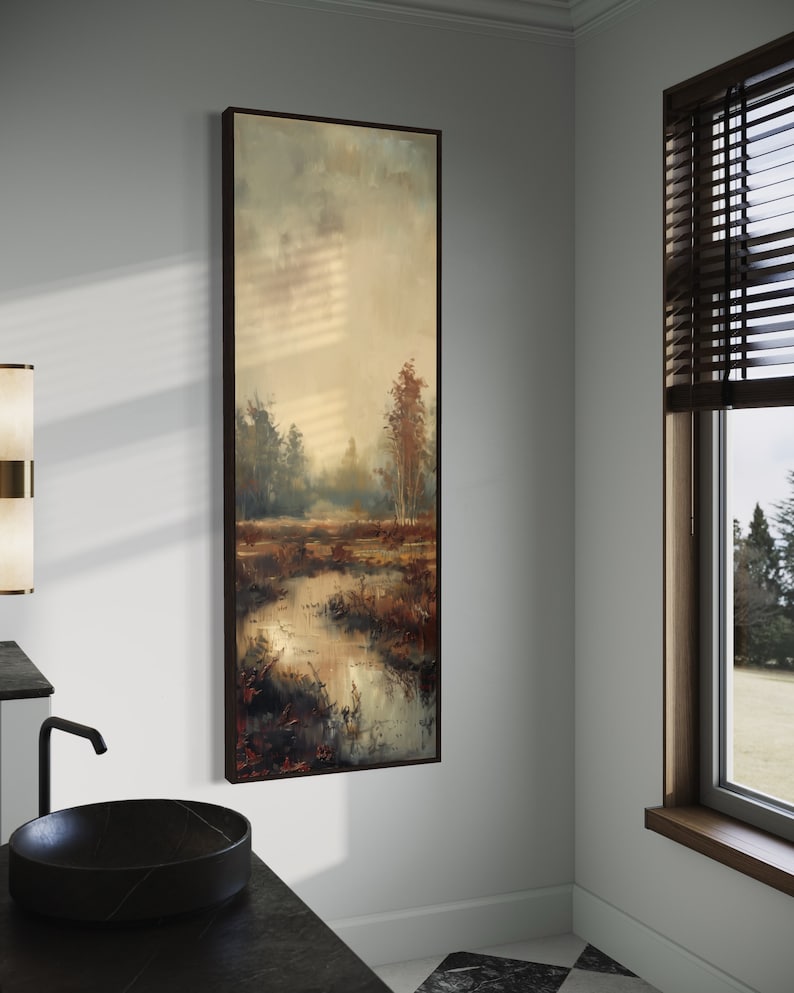 This atmospheric painting captures a moody landscape with a dramatic interplay of light and shadow. A muted palette conveys the serenity of a misty marshland, evoking a sense of quiet introspection.