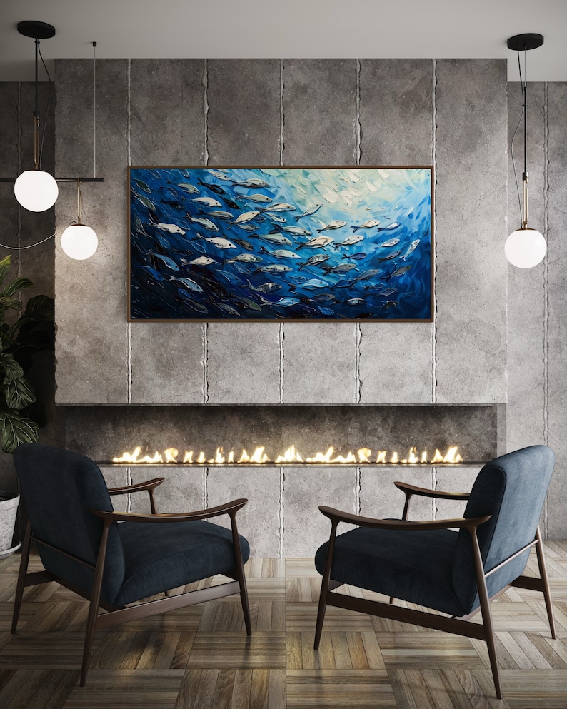 A dynamic school of fish swims in unison through the tranquil blue sea, their silvery scales reflecting light, depicted with thick, textured brushstrokes that give life and movement to this captivating marine scene.