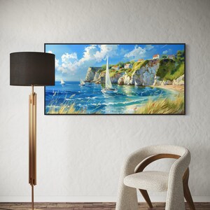 Sailboats glide on azure waters near chalky cliffs with green tops under a vast, cloud-dappled sky, portraying a serene, sunlit seascape.