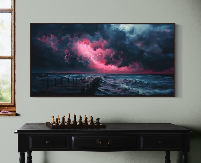 This dramatic storm canvas captures a dark ocean scene with a striking pink lightning sky over a wooden pier. The moody waves and vibrant storm clouds create a bold statement piece. Perfect for lovers of dramatic nature art, coastal décor.
