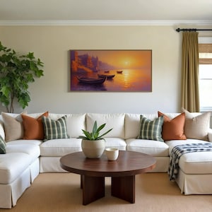 This breathtaking canvas print captures the beauty of the Ganges River at sunrise. The golden light reflects off the calm water, creating a peaceful and spiritual scene. This artwork brings a sense of tranquility and cultural richness to any space.