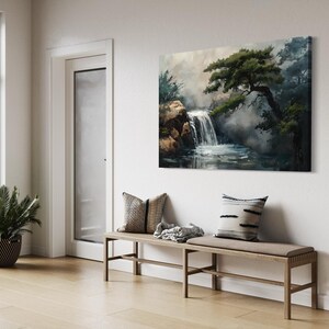 This canvas print beautifully portrays a serene Japanese garden with a cascading waterfall and majestic pine trees, encapsulating the essence of tranquility and the enduring beauty of nature. Perfect for creating a peaceful retreat in your space.