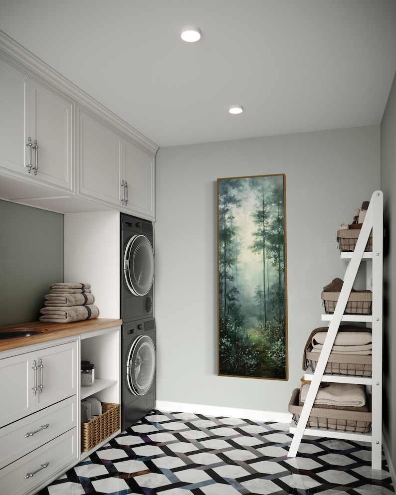 This serene painting depicts a misty forest with tall trees and delicate wildflowers. The soft, muted colors and ethereal atmosphere create a sense of tranquility, perfect for adding a touch of nature and calm to any space.