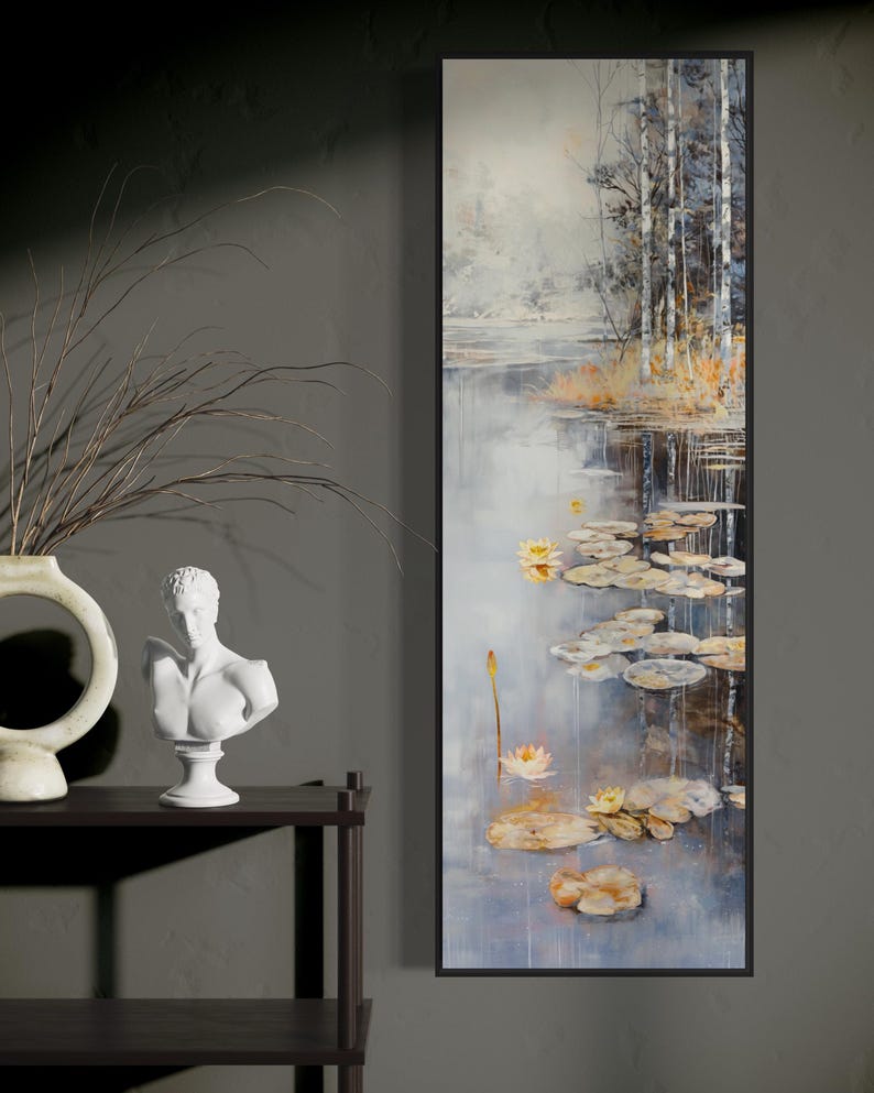 This serene painting features a tranquil pond with lily pads and birch trees. The soft, muted colors and delicate details create a peaceful, reflective scene, perfect for adding a touch of nature and calm to any space.