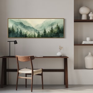 Misty Mountain Serenity: A dreamy vista where lush evergreens pierce through the soft veil of morning mist, creating layers of tranquil beauty.