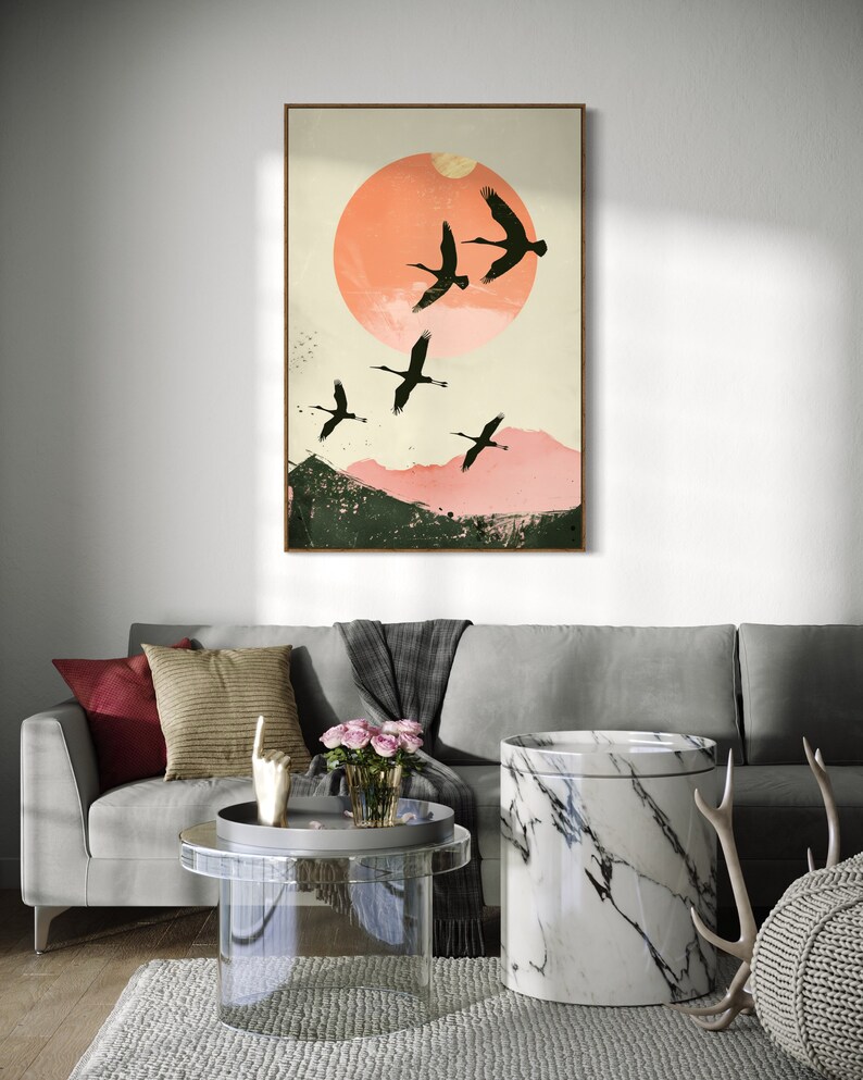 Silhouettes in Flight: A serene composition featuring cranes soaring across a textured pink sunset, their graceful forms framed against a full moon.