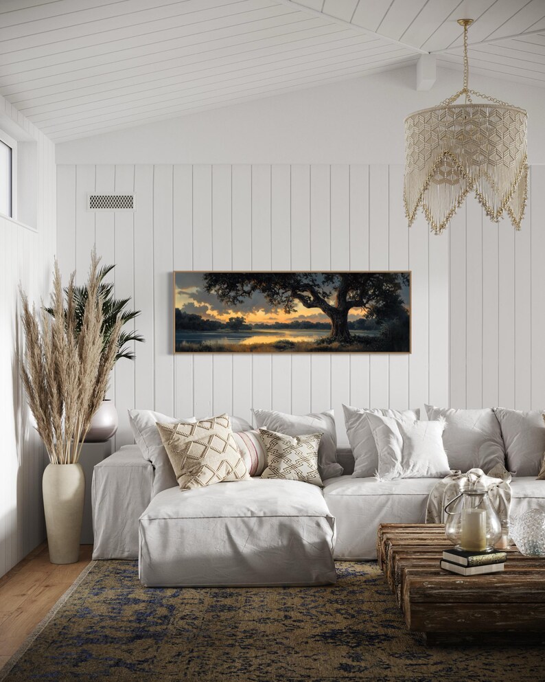 Capturing the tranquil essence of dusk, this panoramic artwork features a majestic oak tree overlooking a serene river, illuminated by the golden hues of a setting sun.