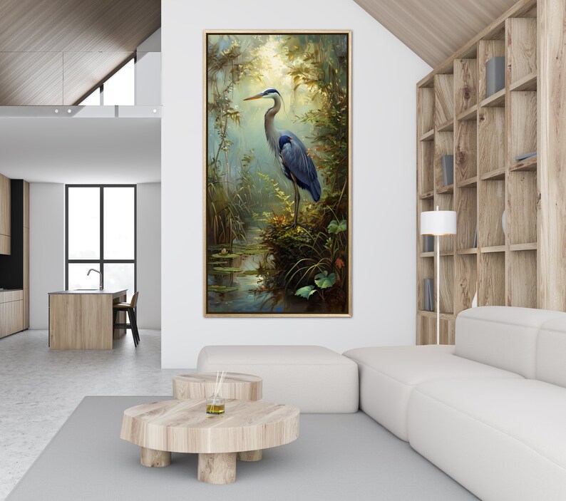 A serene Blue Heron stands amidst a lush wetland oasis, its graceful form bathed in dappled sunlight filtering through a verdant canopy. Perfect for a tranquil decor piece.