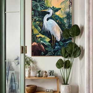 This canvas print captures a majestic heron standing amidst lush tropical foliage, illuminated by a soft, golden sunrise. Its detailed portrayal and vibrant setting make it a striking piece for any nature or bird enthusiast's collection.
