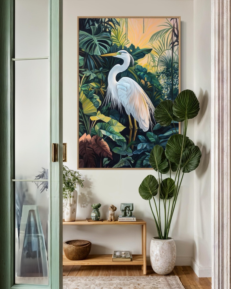 This canvas print captures a majestic heron standing amidst lush tropical foliage, illuminated by a soft, golden sunrise. Its detailed portrayal and vibrant setting make it a striking piece for any nature or bird enthusiast's collection.
