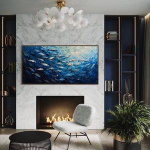 A dynamic school of fish swims in unison through the tranquil blue sea, their silvery scales reflecting light, depicted with thick, textured brushstrokes that give life and movement to this captivating marine scene.