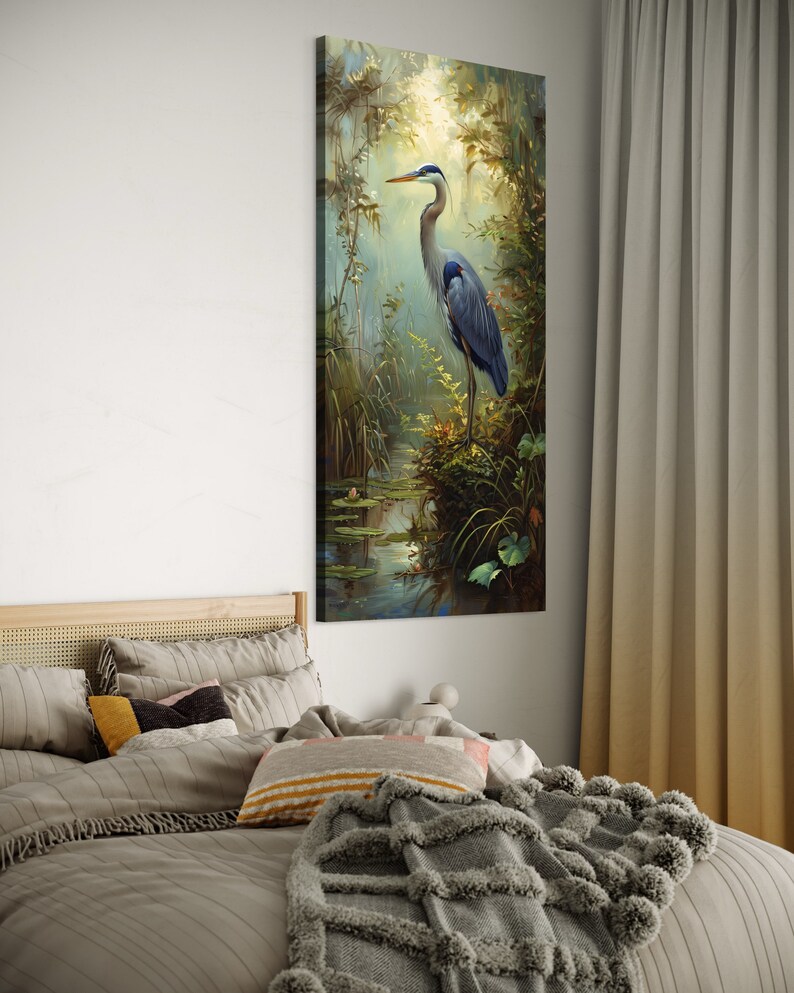 A serene Blue Heron stands amidst a lush wetland oasis, its graceful form bathed in dappled sunlight filtering through a verdant canopy. Perfect for a tranquil decor piece.