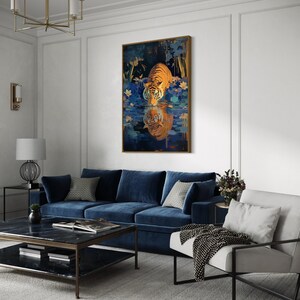 A majestic tiger drinks from a calm lake, its reflection glowing in golden hues. Surrounded by blue flowers and soft light, this art print blends nature with elegance, perfect for boho, nature, or wildlife-themed home decor.
