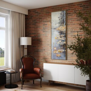 This serene painting features a tranquil pond with lily pads and birch trees. The soft, muted colors and delicate details create a peaceful, reflective scene, perfect for adding a touch of nature and calm to any space.