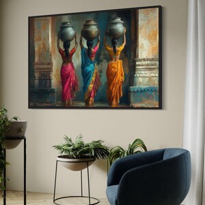 Celebrate cultural beauty with this vibrant art piece depicting three Indian women in colorful saris, gracefully carrying pots on their heads. The rich textures and warm tones make it a stunning addition to any space.