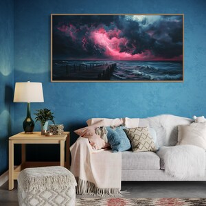 This dramatic storm canvas captures a dark ocean scene with a striking pink lightning sky over a wooden pier. The moody waves and vibrant storm clouds create a bold statement piece. Perfect for lovers of dramatic nature art, coastal décor.