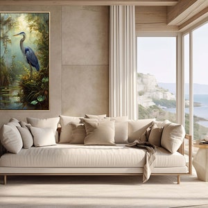 A serene Blue Heron stands amidst a lush wetland oasis, its graceful form bathed in dappled sunlight filtering through a verdant canopy. Perfect for a tranquil decor piece.