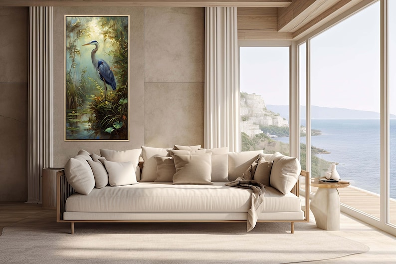 A serene Blue Heron stands amidst a lush wetland oasis, its graceful form bathed in dappled sunlight filtering through a verdant canopy. Perfect for a tranquil decor piece.