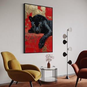 Striking art print of a black panther resting against a rich red and gold abstract background. The panther’s piercing gaze, sleek dark fur, and powerful presence create a dramatic and luxurious statement piece, blending wildlife majesty with bold modern art design for a captivating interior accent.