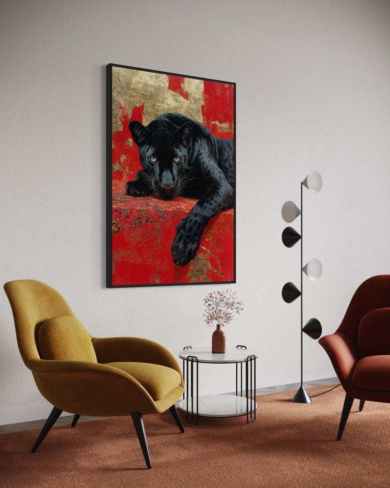 Striking art print of a black panther resting against a rich red and gold abstract background. The panther’s piercing gaze, sleek dark fur, and powerful presence create a dramatic and luxurious statement piece, blending wildlife majesty with bold modern art design for a captivating interior accent.