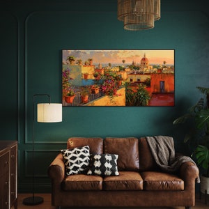 This colorful painting shows a Mexican city at sunset with terracotta rooftops, blooming bougainvillea, and church domes. The warm hues and intricate details evoke the charm and beauty of a picturesque Mexican town, perfect for cultural decor.