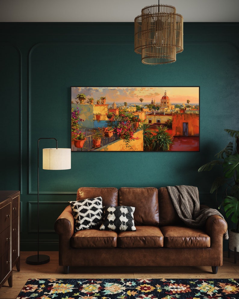 This colorful painting shows a Mexican city at sunset with terracotta rooftops, blooming bougainvillea, and church domes. The warm hues and intricate details evoke the charm and beauty of a picturesque Mexican town, perfect for cultural decor.