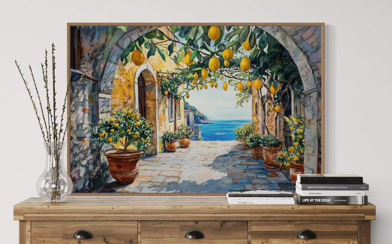 This vibrant artwork captures the charm of an Italian coastal village, featuring lemon trees hanging over a sunlit stone pathway. With a stunning view of the sea, this piece brings Mediterranean warmth and rustic beauty into your home.