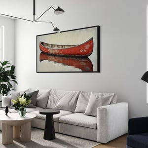 This artwork features a rustic red canoe resting serenely on calm waters. The canoe, with its weathered surface, reflects beautifully in the water, showcasing its rich color. The soft background adds a tranquil atmosphere, perfect for nature lovers.