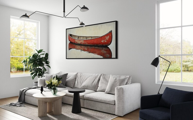 This artwork features a rustic red canoe resting serenely on calm waters. The canoe, with its weathered surface, reflects beautifully in the water, showcasing its rich color. The soft background adds a tranquil atmosphere, perfect for nature lovers.