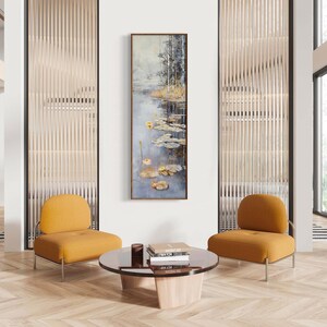 This serene painting features a tranquil pond with lily pads and birch trees. The soft, muted colors and delicate details create a peaceful, reflective scene, perfect for adding a touch of nature and calm to any space.