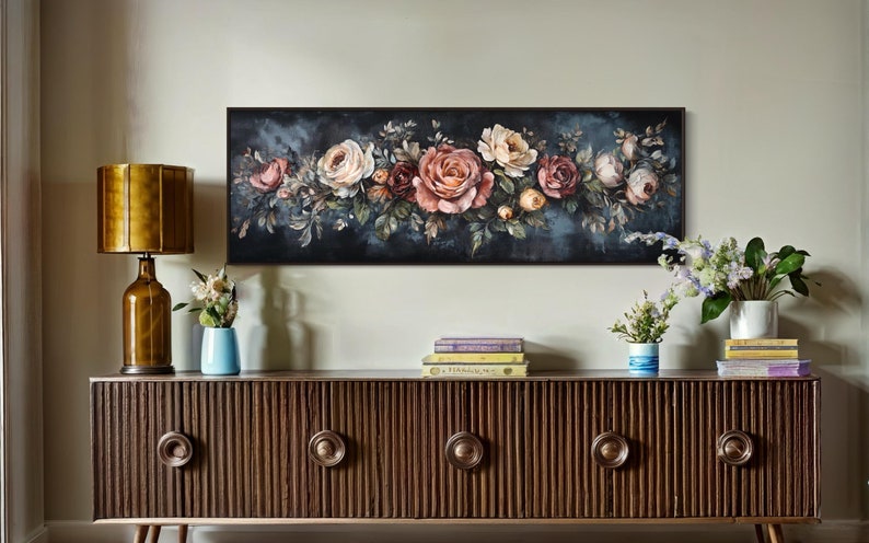 This Victorian-inspired floral canvas art showcases a stunning arrangement of roses in soft pink, cream, and deep red hues. Set against a moody dark blue background, it exudes timeless elegance and romantic charm.