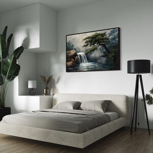This canvas print beautifully portrays a serene Japanese garden with a cascading waterfall and majestic pine trees, encapsulating the essence of tranquility and the enduring beauty of nature. Perfect for creating a peaceful retreat in your space.