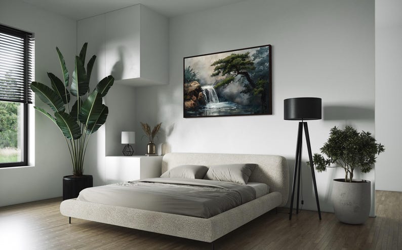 This canvas print beautifully portrays a serene Japanese garden with a cascading waterfall and majestic pine trees, encapsulating the essence of tranquility and the enduring beauty of nature. Perfect for creating a peaceful retreat in your space.