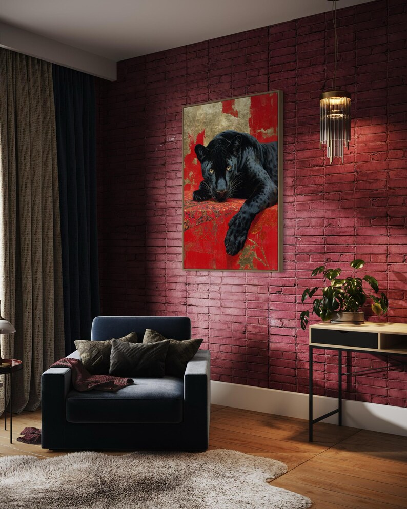 Striking art print of a black panther resting against a rich red and gold abstract background. The panther’s piercing gaze, sleek dark fur, and powerful presence create a dramatic and luxurious statement piece, blending wildlife majesty with bold modern art design for a captivating interior accent.