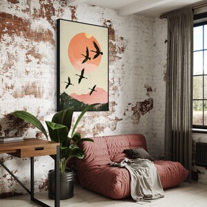 Silhouettes in Flight: A serene composition featuring cranes soaring across a textured pink sunset, their graceful forms framed against a full moon.