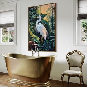 This canvas print captures a majestic heron standing amidst lush tropical foliage, illuminated by a soft, golden sunrise. Its detailed portrayal and vibrant setting make it a striking piece for any nature or bird enthusiast's collection.