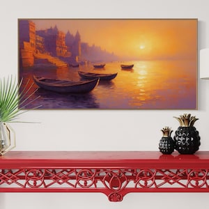 This breathtaking canvas print captures the beauty of the Ganges River at sunrise. The golden light reflects off the calm water, creating a peaceful and spiritual scene. This artwork brings a sense of tranquility and cultural richness to any space.