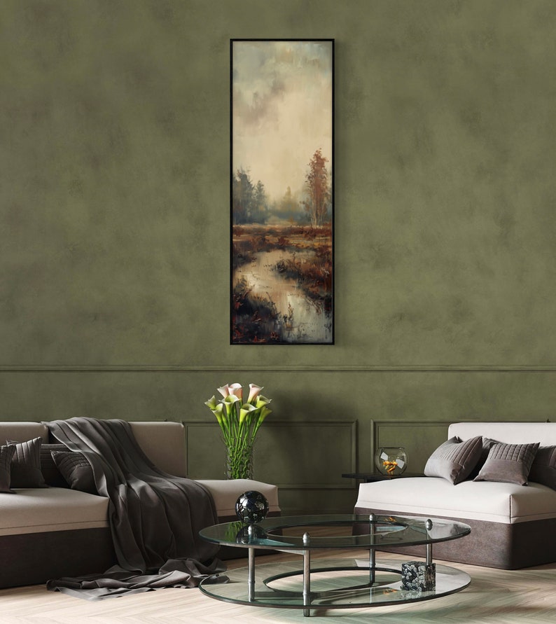 This atmospheric painting captures a moody landscape with a dramatic interplay of light and shadow. A muted palette conveys the serenity of a misty marshland, evoking a sense of quiet introspection.
