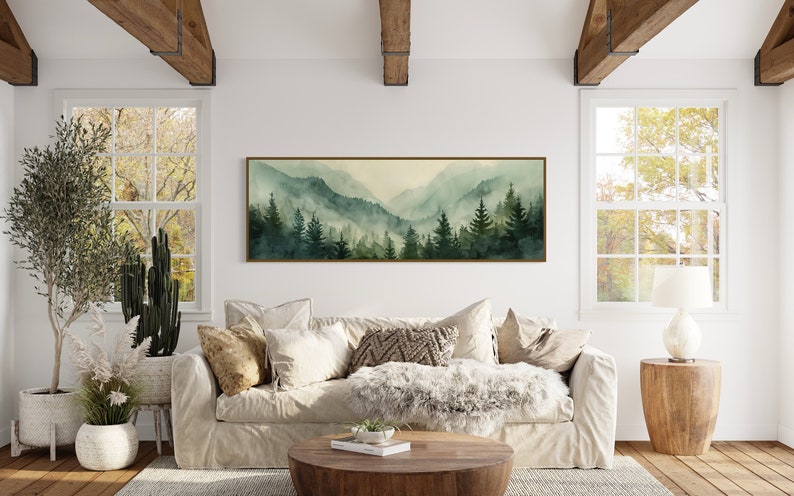 Misty Mountain Serenity: A dreamy vista where lush evergreens pierce through the soft veil of morning mist, creating layers of tranquil beauty.
