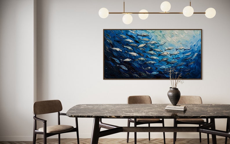 A dynamic school of fish swims in unison through the tranquil blue sea, their silvery scales reflecting light, depicted with thick, textured brushstrokes that give life and movement to this captivating marine scene.