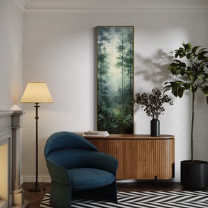 This serene painting depicts a misty forest with tall trees and delicate wildflowers. The soft, muted colors and ethereal atmosphere create a sense of tranquility, perfect for adding a touch of nature and calm to any space.
