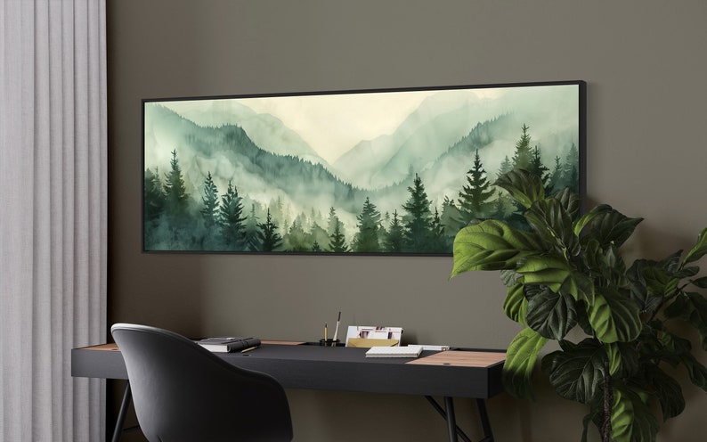 Misty Mountain Serenity: A dreamy vista where lush evergreens pierce through the soft veil of morning mist, creating layers of tranquil beauty.