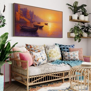 This breathtaking canvas print captures the beauty of the Ganges River at sunrise. The golden light reflects off the calm water, creating a peaceful and spiritual scene. This artwork brings a sense of tranquility and cultural richness to any space.