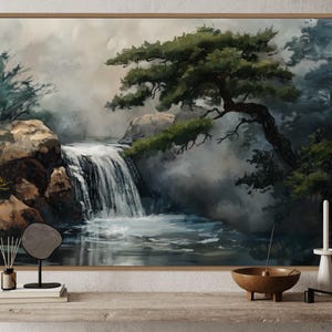This canvas print beautifully portrays a serene Japanese garden with a cascading waterfall and majestic pine trees, encapsulating the essence of tranquility and the enduring beauty of nature. Perfect for creating a peaceful retreat in your space.