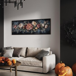 This Victorian-inspired floral canvas art showcases a stunning arrangement of roses in soft pink, cream, and deep red hues. Set against a moody dark blue background, it exudes timeless elegance and romantic charm.