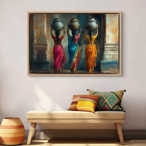 Celebrate cultural beauty with this vibrant art piece depicting three Indian women in colorful saris, gracefully carrying pots on their heads. The rich textures and warm tones make it a stunning addition to any space.