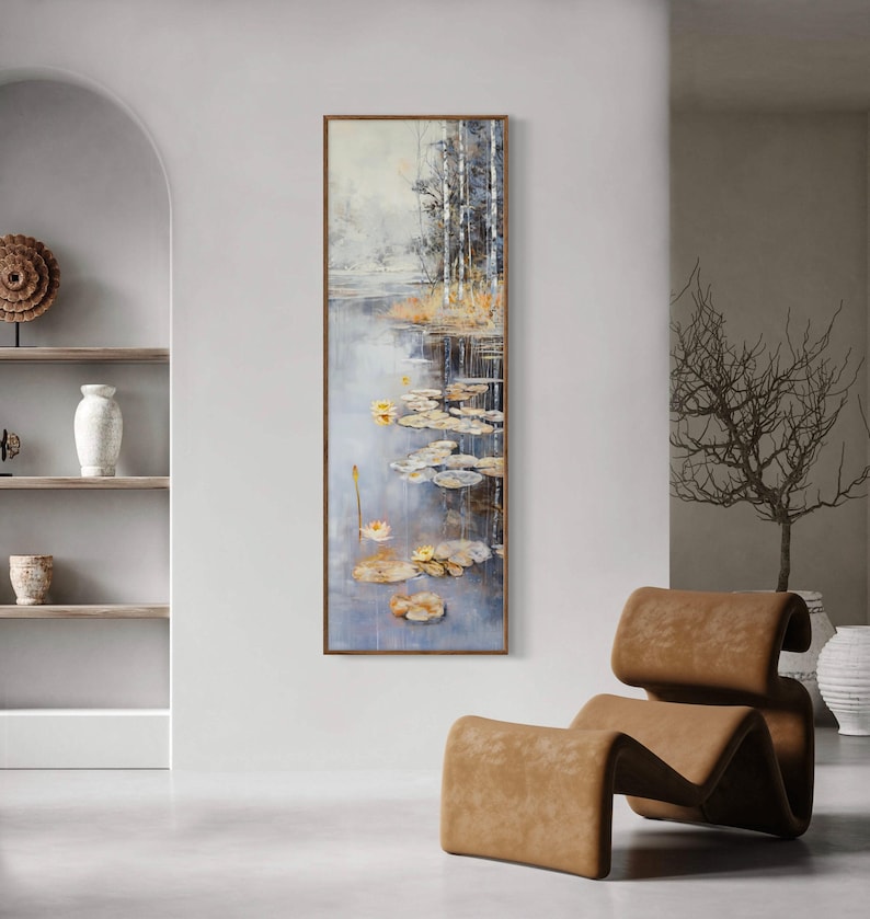 This serene painting features a tranquil pond with lily pads and birch trees. The soft, muted colors and delicate details create a peaceful, reflective scene, perfect for adding a touch of nature and calm to any space.