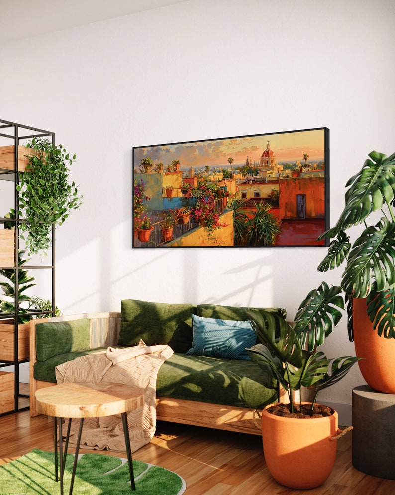 This colorful painting shows a Mexican city at sunset with terracotta rooftops, blooming bougainvillea, and church domes. The warm hues and intricate details evoke the charm and beauty of a picturesque Mexican town, perfect for cultural decor.